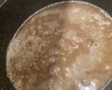A picture of step 1 of Mdardara - brown lentils and rice with fried onions.