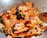 A picture of step 4 of Seyal phulka (leftover rotis in garlic tomato curry).