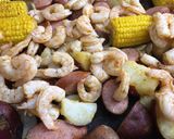 A picture of step 4 of Sheet pan shrimp boil.
