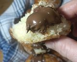 A picture of step 14 of Mardi Gras Chocolate Donuts.