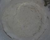 A picture of step 2 of Eggless cooker cake.