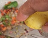 A picture of step 4 of Double tadka lahsuni Palak khichdi.