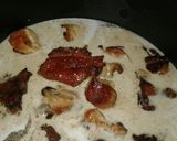 A picture of step 3 of Coconut chicken and soft layerd chapati.
