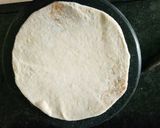 A picture of step 6 of Alu paneer paratha serve with boondi raita.