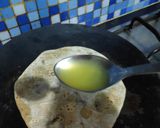 A picture of step 14 of Anjeer gud ki puran poli.