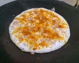 A picture of step 4 of Onion Podi Uttapam.