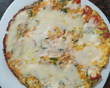 Foto del paso 5 de la receta: Tortilla de zanahoria y tomate con queso.