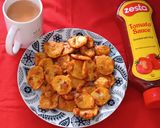 A picture of step 3 of Sattu Flour Maru Bhajiya.