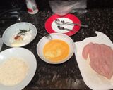 A picture of step 1 of Chicken schitty w/garlic mash + beans.
