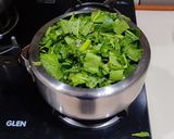 A picture of step 3 of Sarso Ka Saag (sarso, palak, bathua).