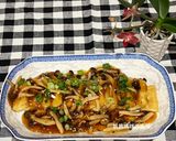 A picture of step 8 of Braised Mushrooms and Tofu.