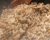 A picture of step 5 of Mdardara - brown lentils and rice with fried onions.