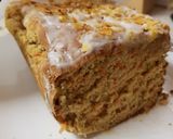 A picture of step 4 of Carrot & Banana Cake topped with icing and Banana crisp. 😀.