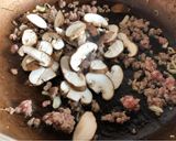 A picture of step 2 of Eatclean / Oatmeal Porridge with Ground Pork, Mushrooms & Soft-Boiled Egg.