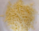 A picture of step 2 of My Parmesan melted Cheese over French fries 😘.