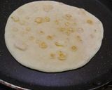 A picture of step 6 of Jain Cheese burst pizza.