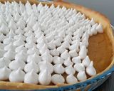 Une image de l'étape 14 de Tarte au pamplemousse meringuée à la pistache.
