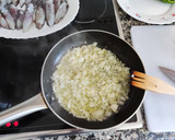 Foto del paso 4 de la receta: Chipirones en su tinta con arroz