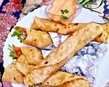 A picture of step 8 of Chicken tikka paratha roll.