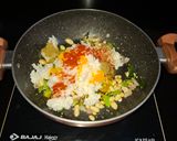 A picture of step 3 of Fried curd Rice.