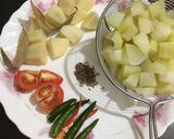 A picture of step 1 of Papaya and Fritters Curry.