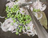 A picture of step 2 of Onion Green Peas Pulao with leftover Rice.