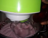 A picture of step 3 of Strawberry milk cake with whipped cream frosting.