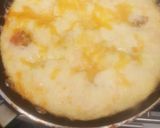 A picture of step 5 of Two cheese and cherry tomato omelette :).