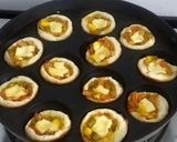A picture of step 8 of Bread pizza cups.