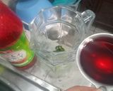 A picture of step 2 of LAAL SHARBAT MOJITO😋.