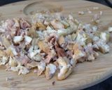 A picture of step 10 of Roast boneless chicken with chestnut, cranberry, apple, brown rice and rum stuffing.