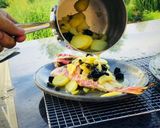 A picture of step 2 of Whole Baked Fish with potatoes and olives.