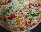 चिज्जी पिज़्ज़ा (cheesy pizza recipe in Hindi) रेसिपी चरण 10 फोटो