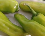 A picture of step 1 of Green chilli in curd.
