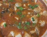 A picture of step 5 of Sicilian Hake Stew with Raisins and Mushrooms.