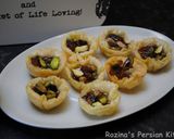A picture of step 17 of Raisins-Pistachio Baklava.