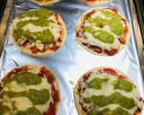 A picture of step 8 of Mini Shredded Salsa Chicken Tortilla Pizzas 🍕.