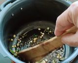 A picture of step 1 of Whole Jowar Upma in Pressure cooker.