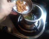 A picture of step 2 of Herbal jaggery tea.