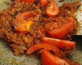A picture of step 10 of AlOO BESAN TARAKARI.