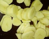 Foto del paso 3 de la receta: Pechito de cerdo con Papas al horno