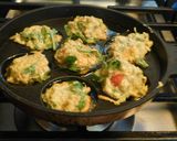 A picture of step 2 of Spicy cheesy healthy kuzhi appam with left over idli batter.