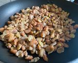 A picture of step 2 of Fūl Medames – dried fava bean stew.