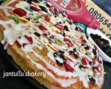 A picture of step 11 of Cake pizza.