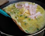 Foto del paso 7 de la receta: Omelette con cebollín y jamón o queso