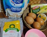 Foto langkah ke 1 dari resep Bolu Ketan Hitam Keju Lumer.