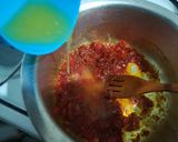 A picture of step 6 of Orange flavoured chips masala.