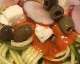 A picture of step 4 of Zucchini Spaghetti with Tomato Sauce, Kalamata Olives, Feta, and Radishes.