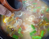 Foto del paso 9 de la receta: Arroz de calamares y alcachofas 🦑