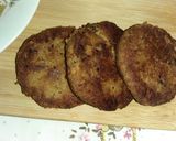 A picture of step 4 of Qeemay rice with shami kabab and vegetables salad.